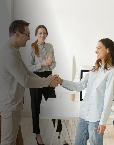 Team members receiving corporate gift cards as part of employee rewards and appreciation programs