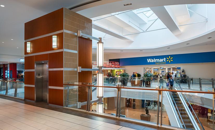 Accessible mall interior with elevators, escalators, and barrier-free access for easy movement