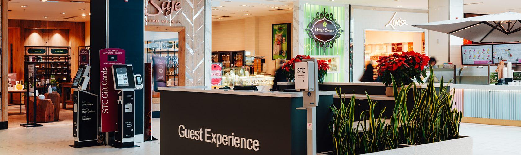 Guest services desk at STC Mall offering visitor support, gift cards, and shopping assistance