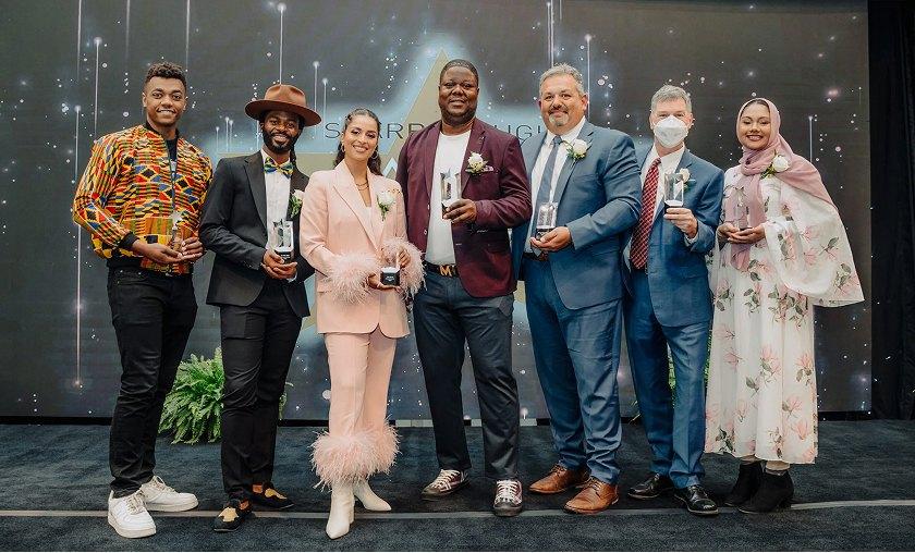 Community leaders at an event reflecting strong partnerships and meaningful local impact