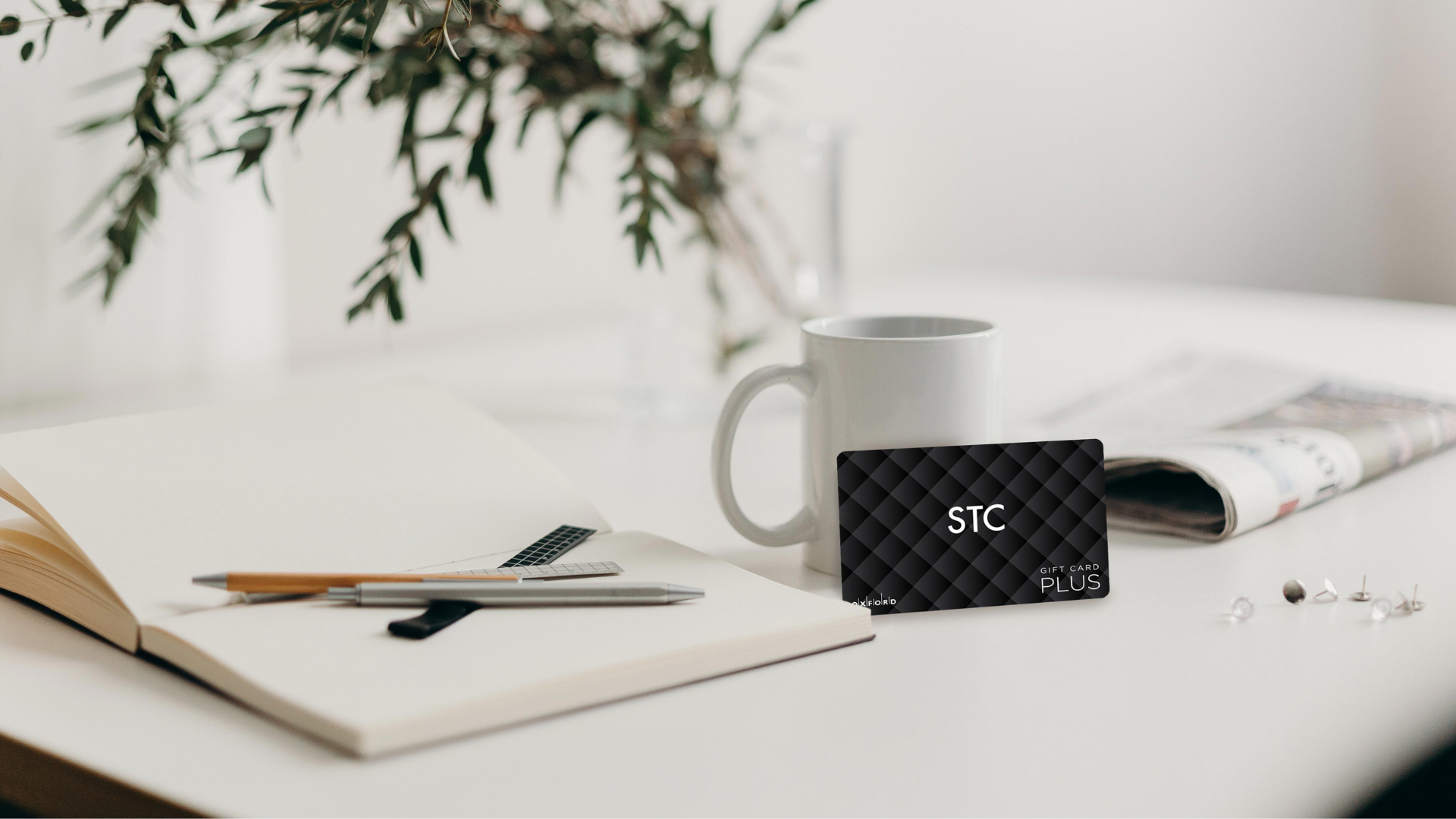 STC Gift Card Image with Gift Card and Coffee Mug