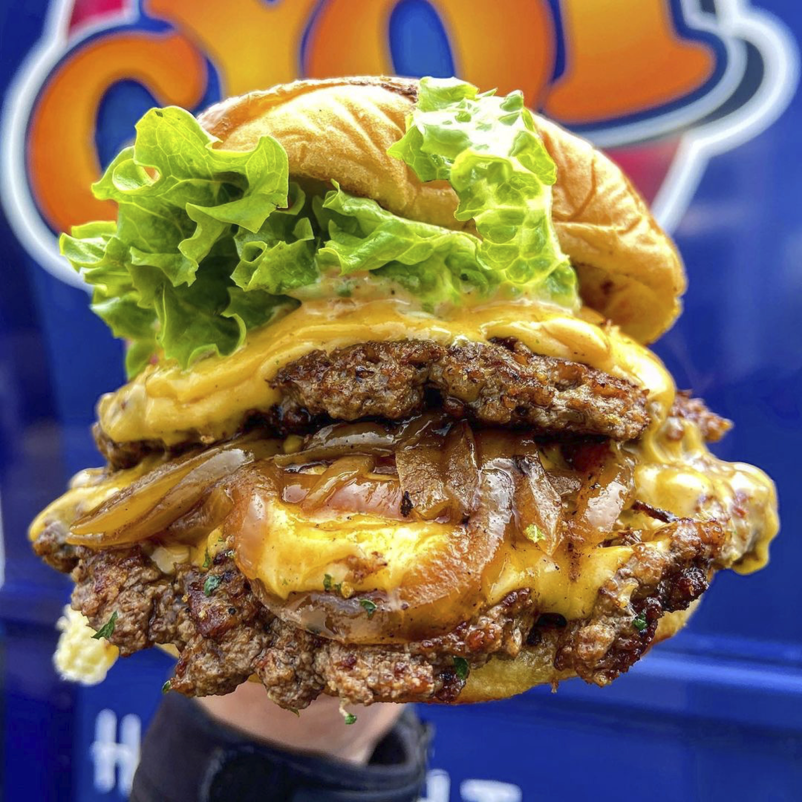 Cheeseburger with melted cheese and lettuce