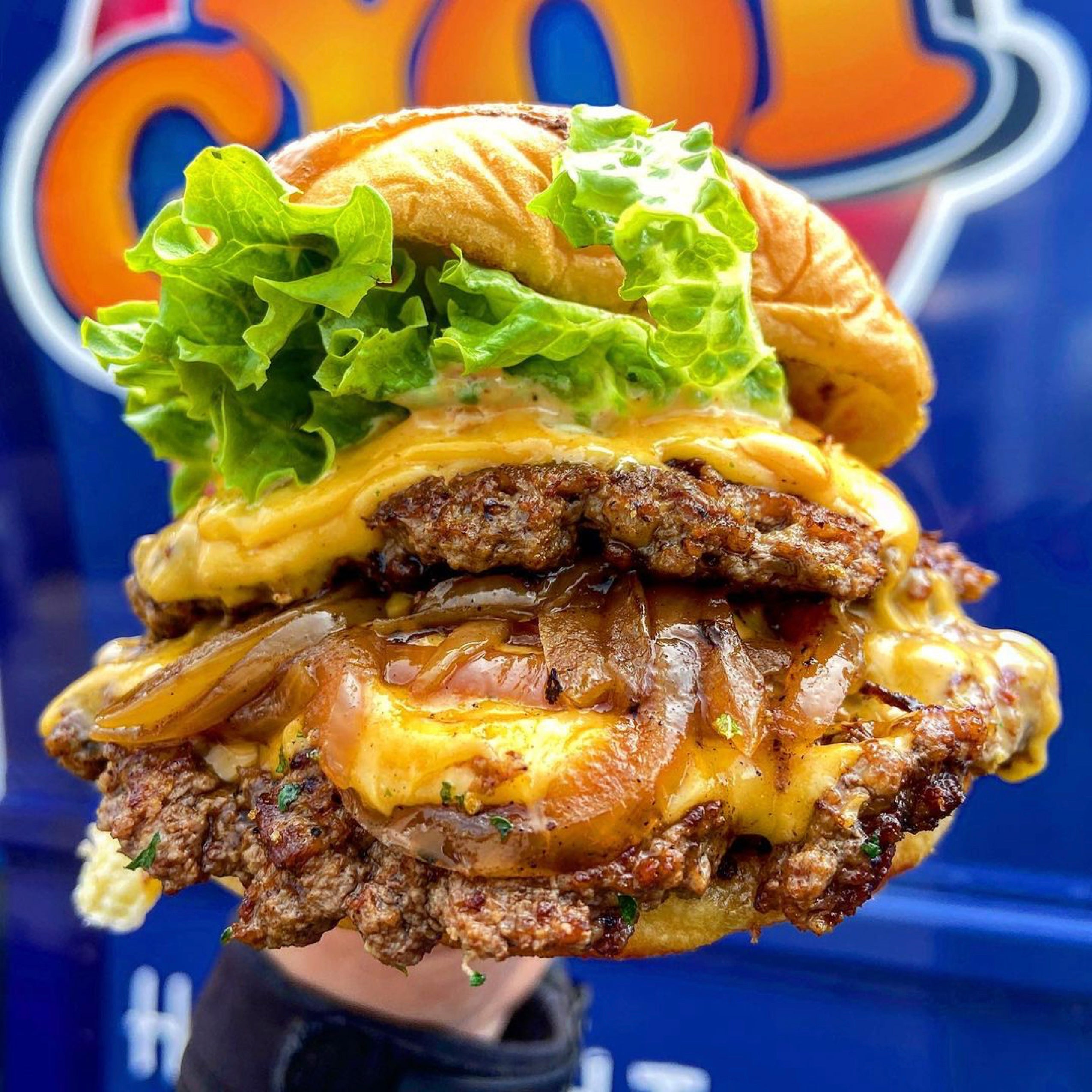 Cheeseburger with melted cheese and lettuce