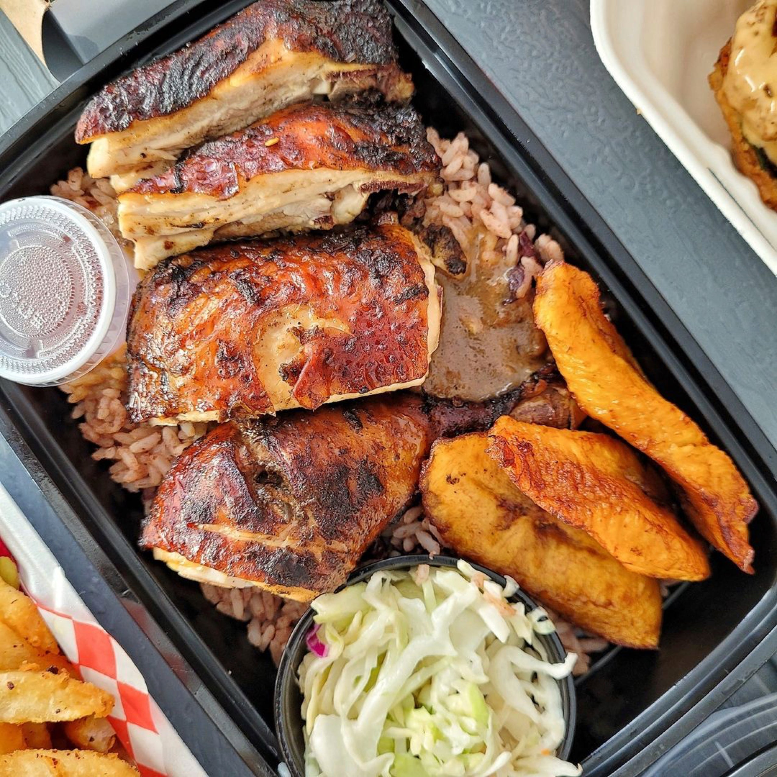 Grilled chicken with rice and potato wedges