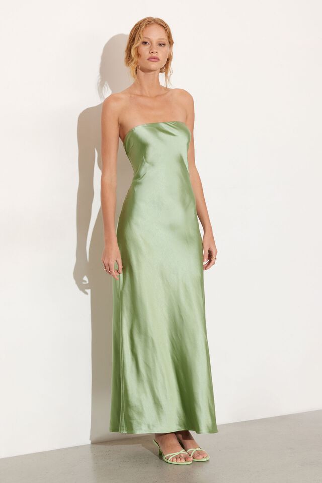 Image of a model wearing a strapless pistachio green satin gown