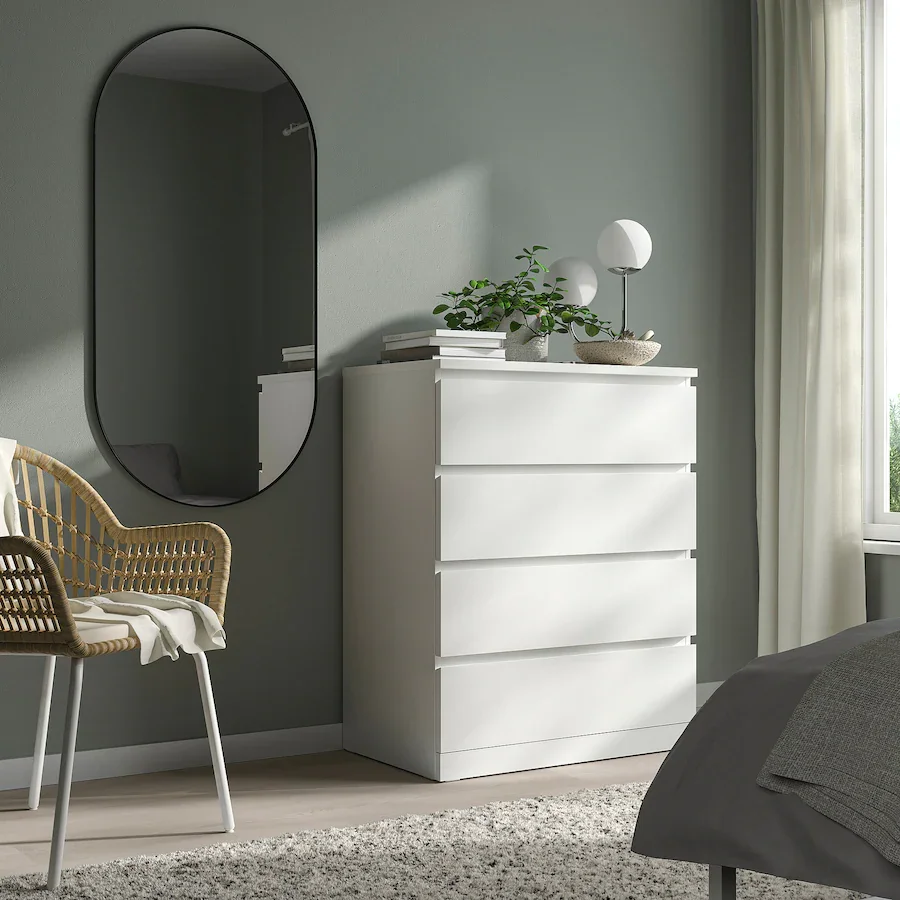 white chest of drawers in a room