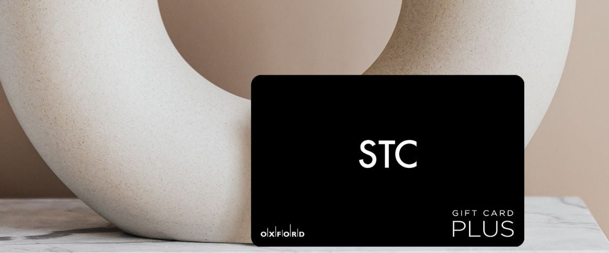 stc gift card in front of vase