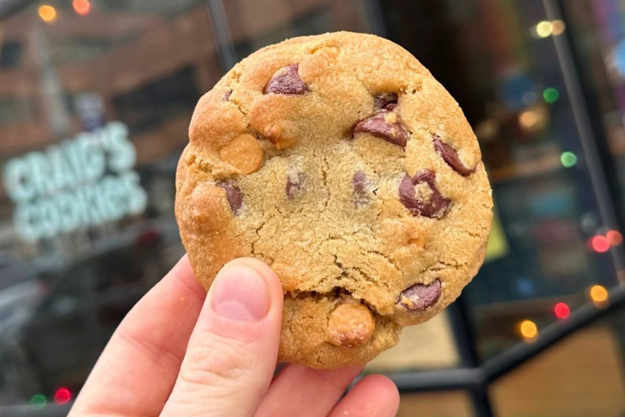 a person holding a cookie