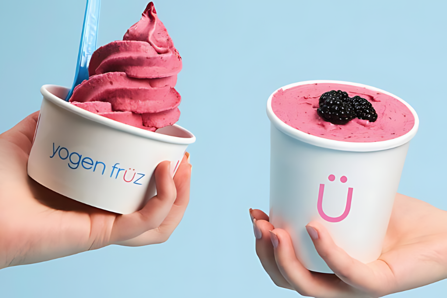 two cups of blackberry frozen yogurt from yogen fruz