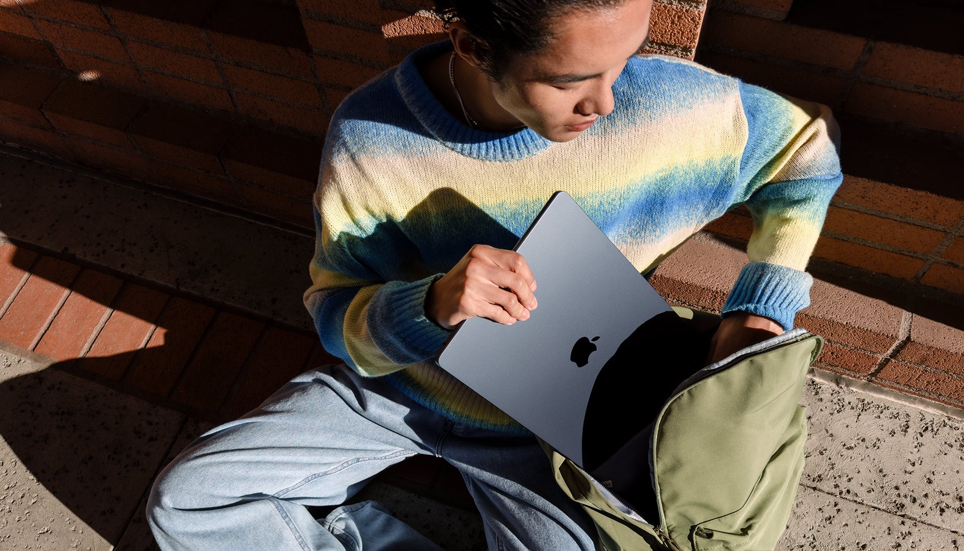 student with macbook