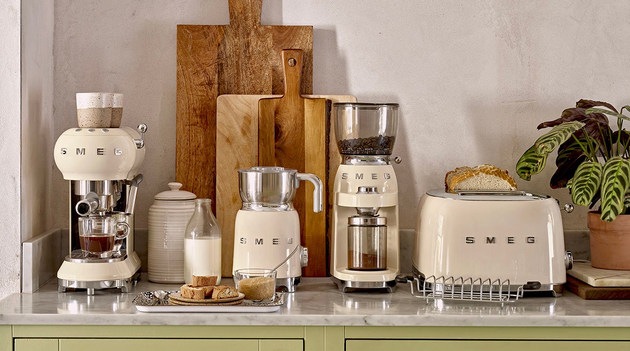 Smeg cream appliances on top a kitchen counter