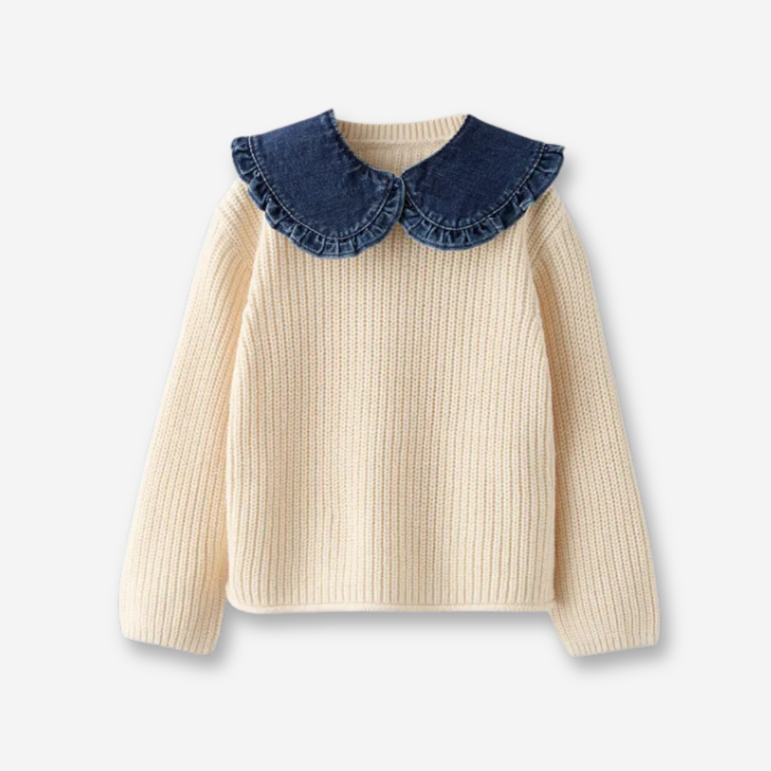 Childrens white long sleeve sweater with navy collar.