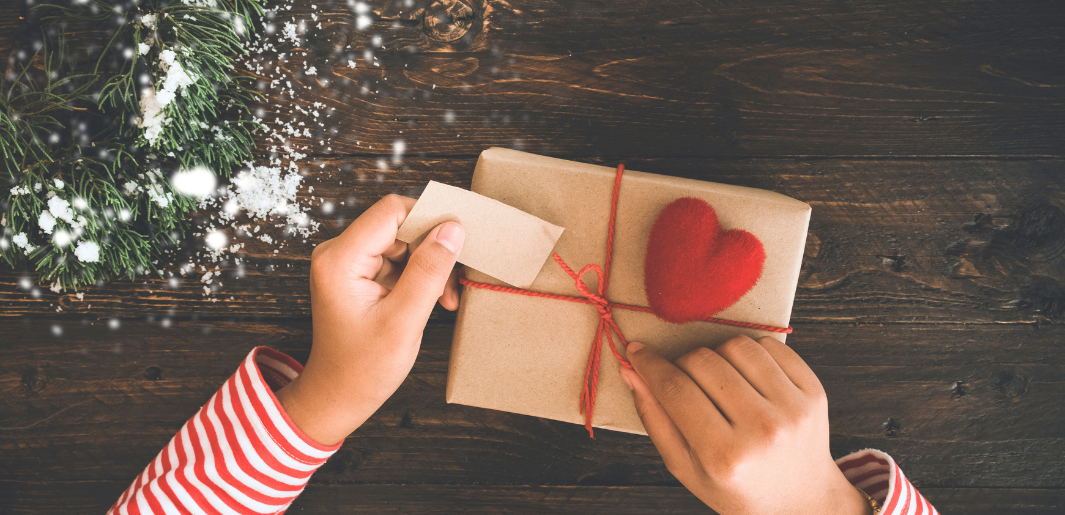 a person wrapping a present