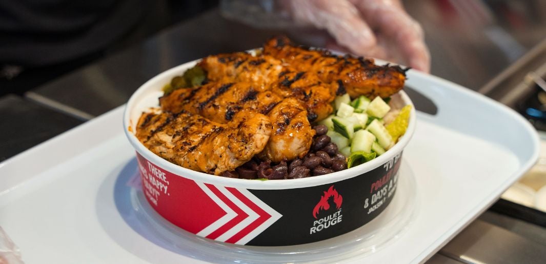 Bowl of grilled chicken and toppings