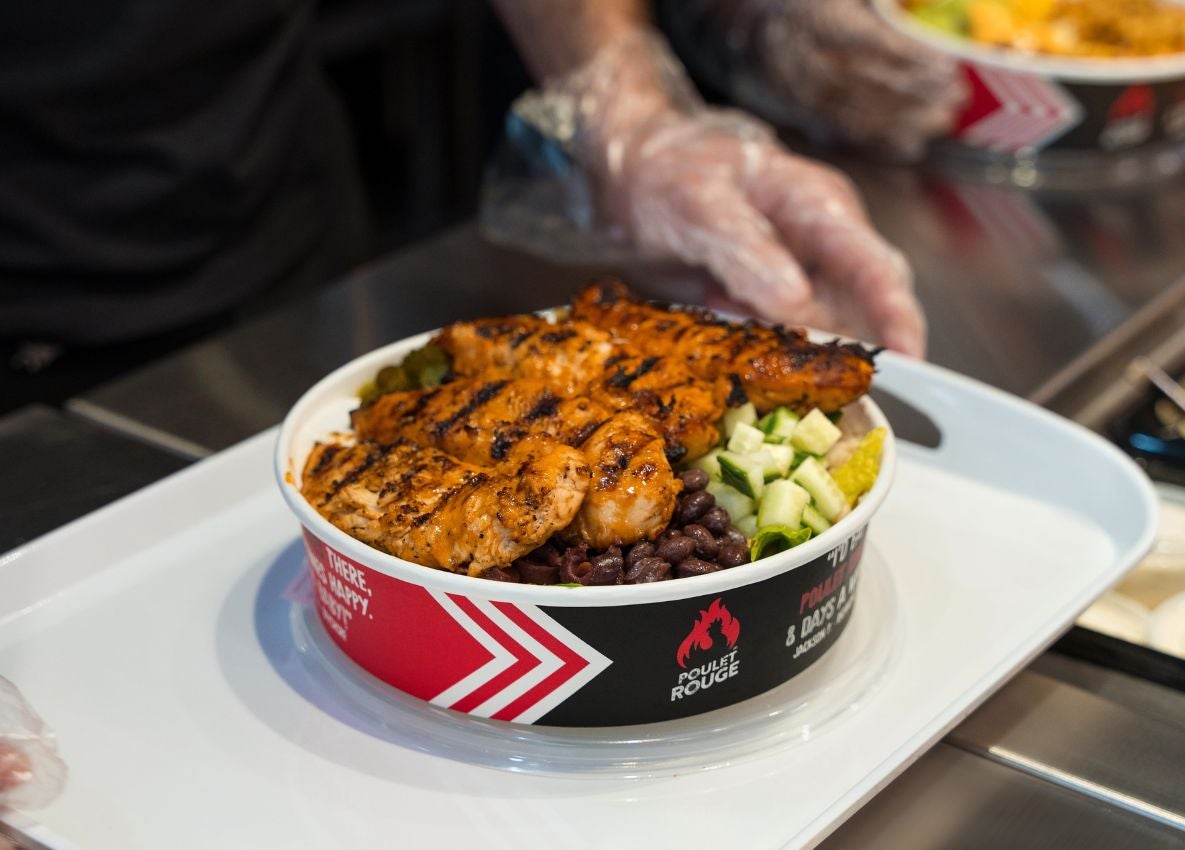 Bowl of grilled chicken and toppings