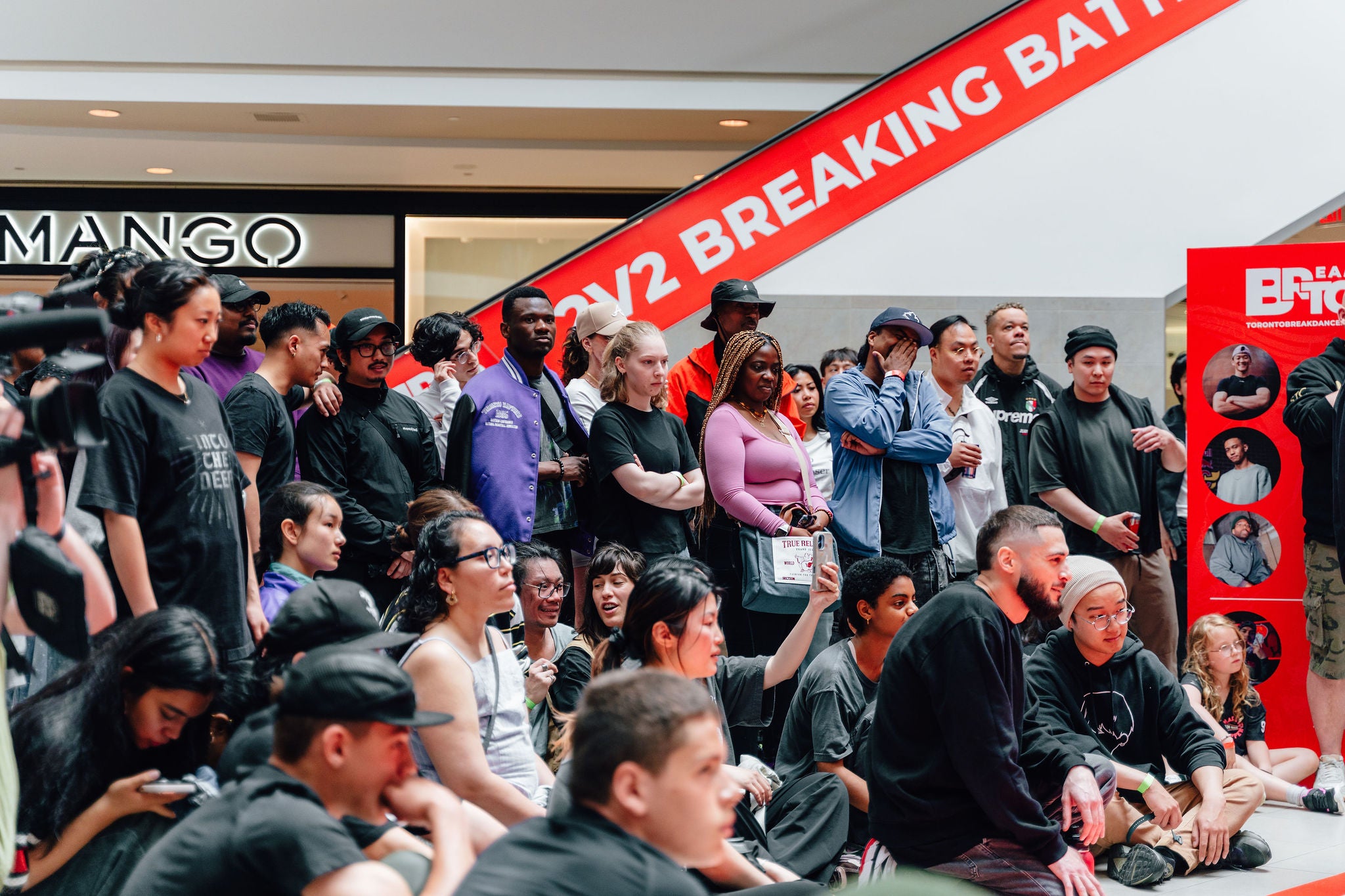 crowd watching breakdance