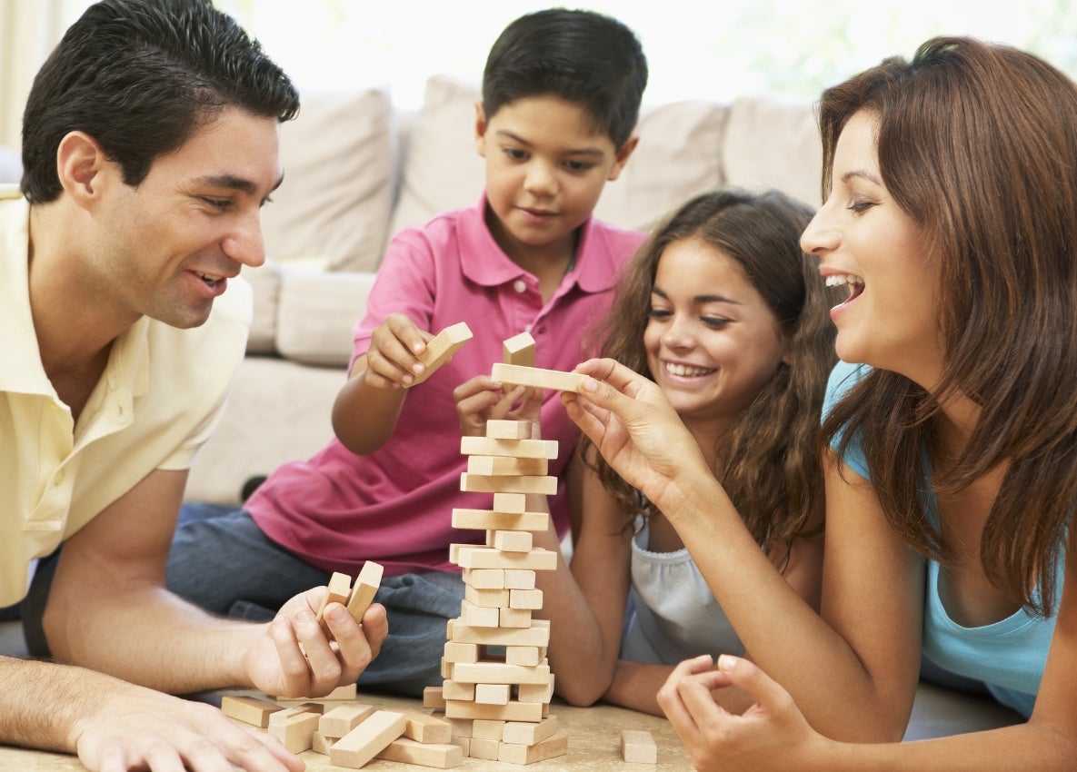 a family playing jenga
