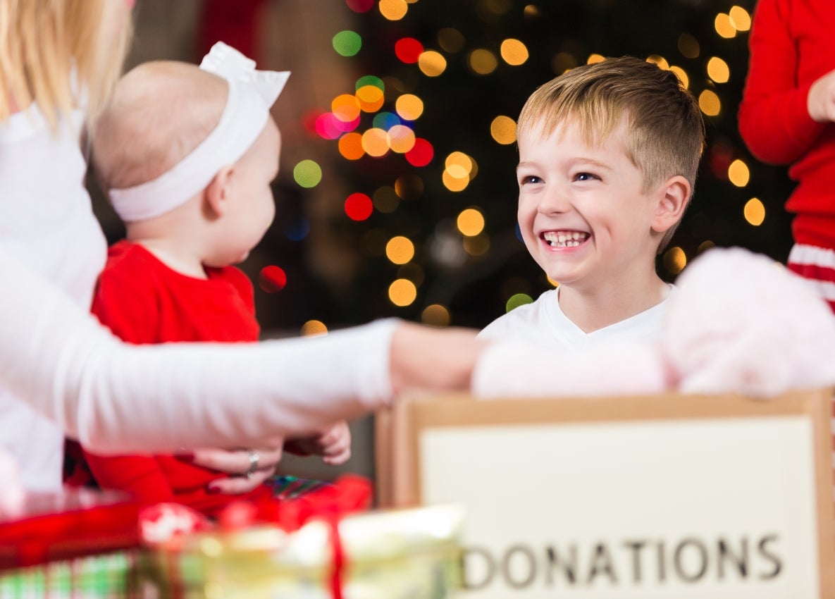 happy child receiving toy donations