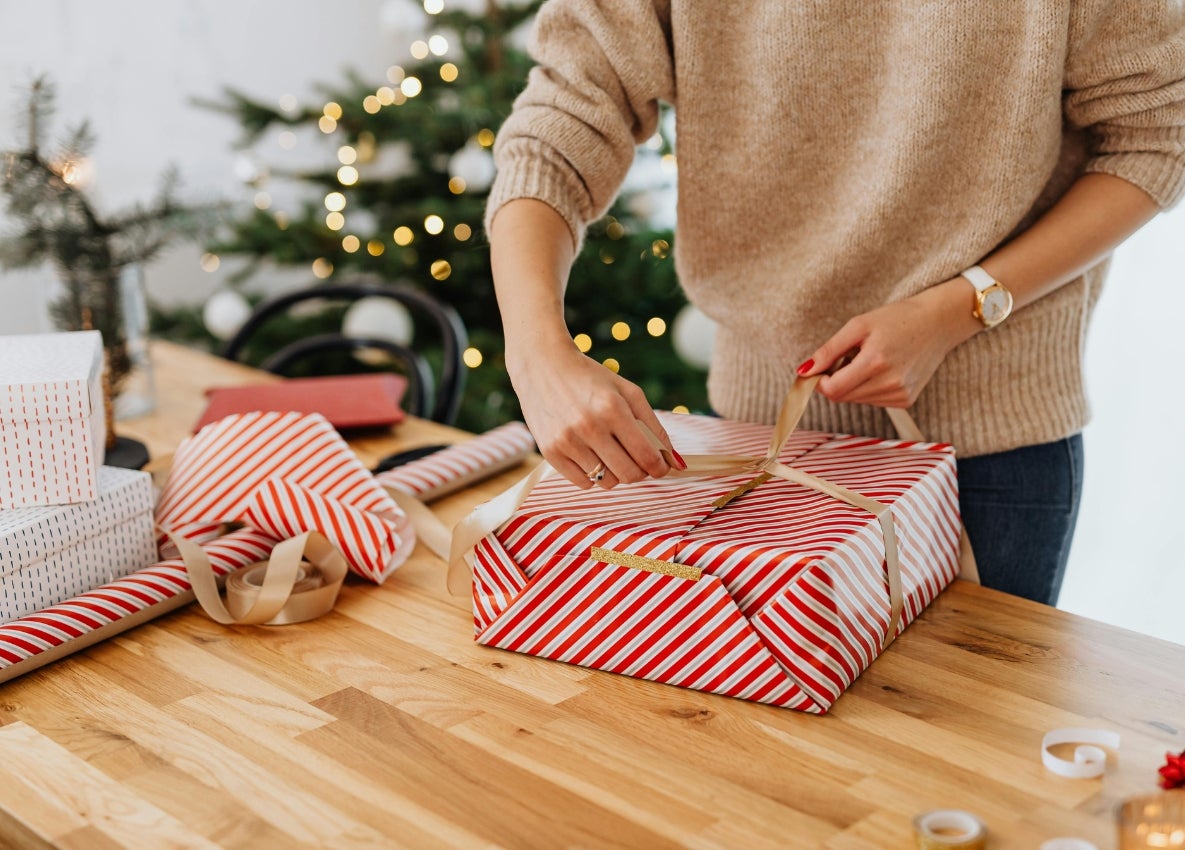a person wrapping gifts