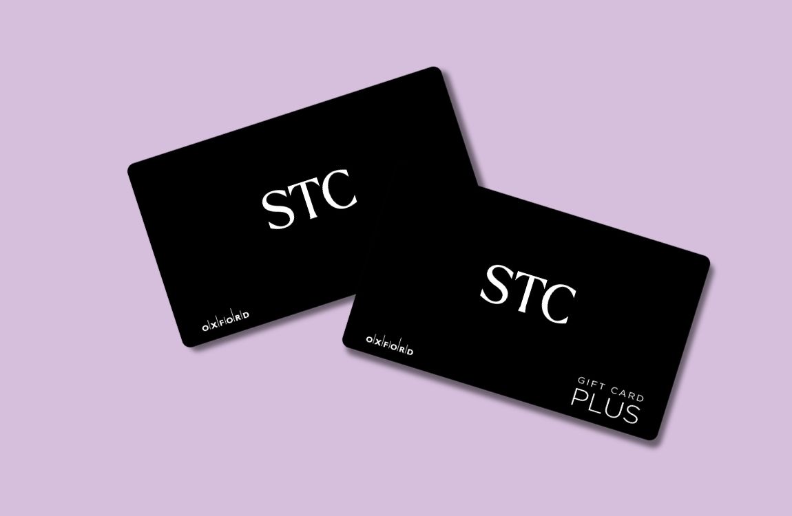 lavendar background with black gift card